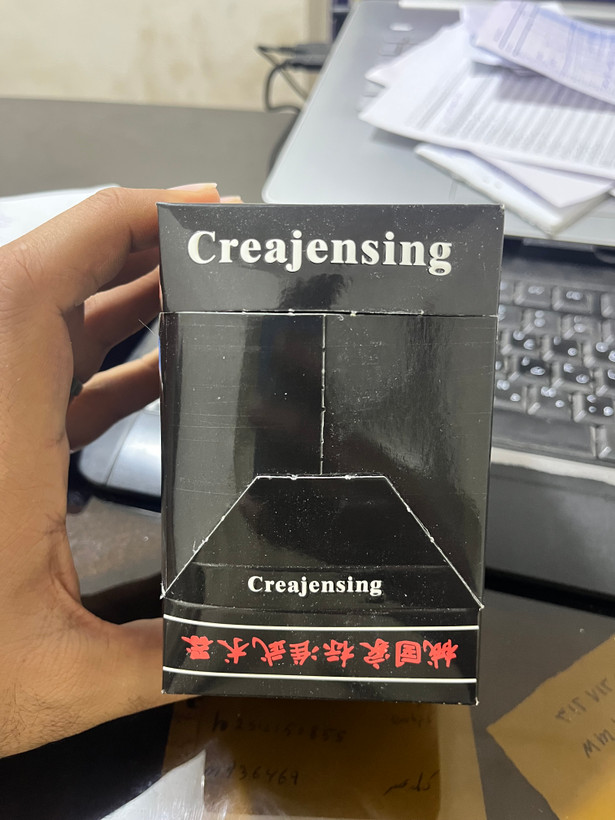 عکس وجه مشکی جعبه Creajensing در دست
